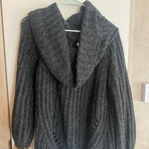 Sweater with scarf-like neckline